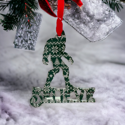 Bigfoot-themed Christmas tree ornament with a belief theme.